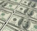 U.S. dollar slips as markets await Fed policy meeting