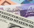 Pound jumps on Brexit deal hopes; dollar edges lower