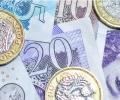 Brexit vote delayed; pound eases from 5-month highs